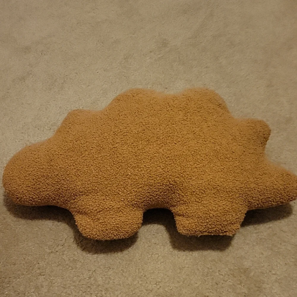 FREE W ANY PURCHASE!Plush Dino Bath & Skin Plush Cushion - Brown